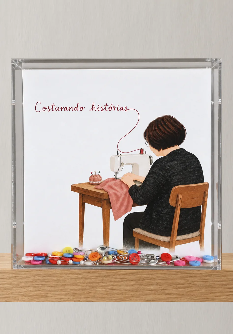 Quadro personalizado "Costurando histórias" com ilustração e botões e alfinetes em cerâmica, em moldura de acrílico